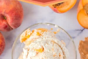 1 photo of No-Churn Peach Ice Cream with text overlay for Pinterest.