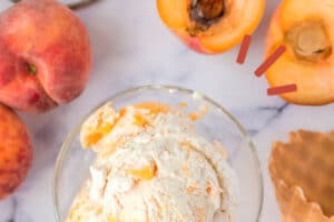 1 photo of No-Churn Peach Ice Cream with text overlay for Pinterest.