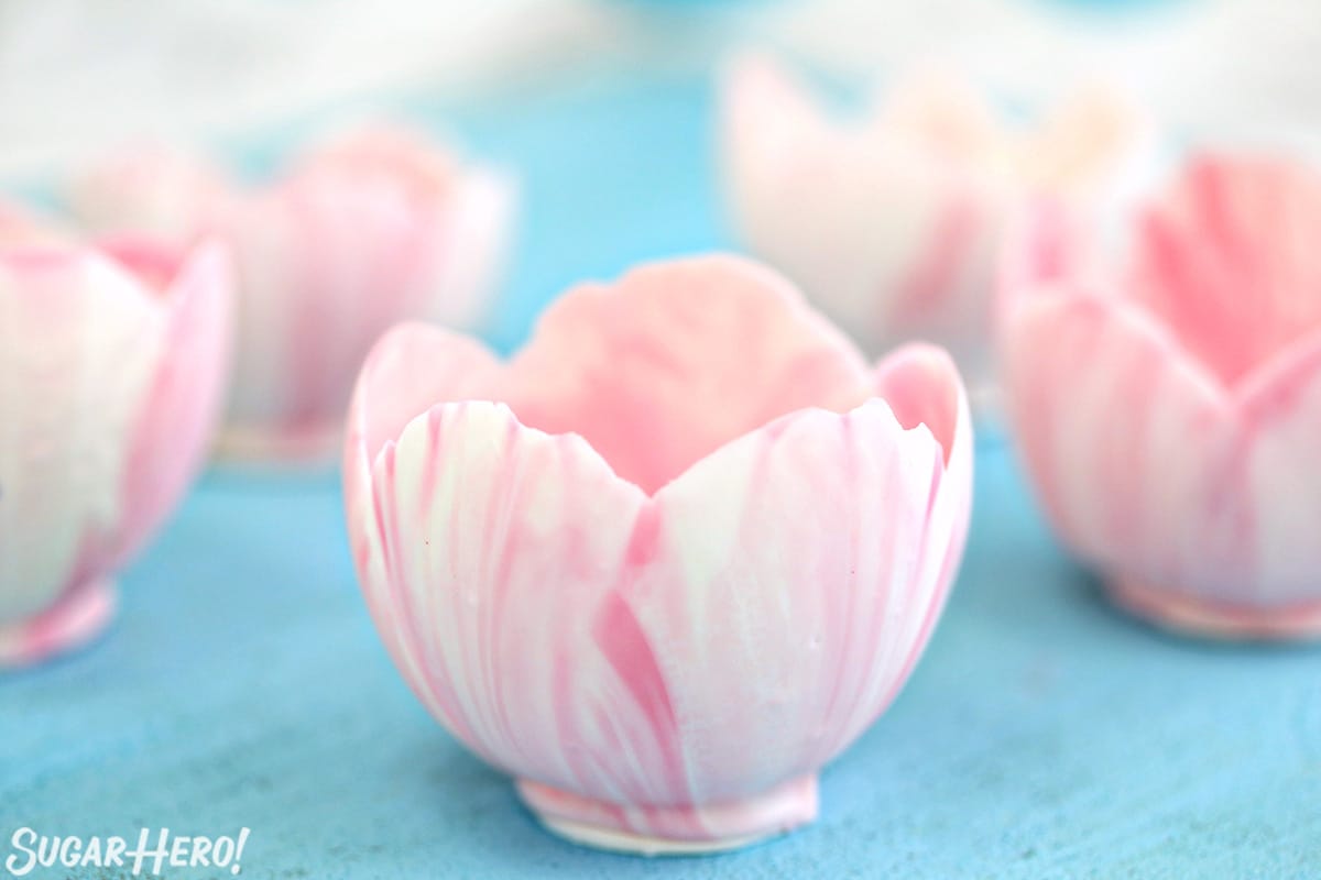 Close up of a pink and white Chocolate Bowl.