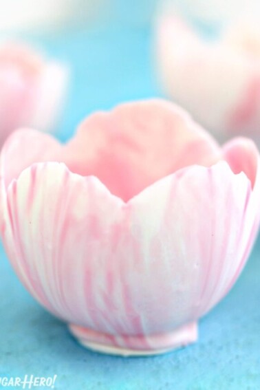 Close up of a pink and white Chocolate Bowl.