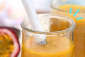 Photo of passion fruit puree with text overlay for Pinterest.