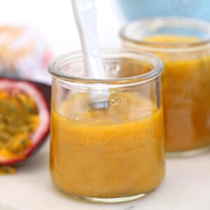 Close-up of a jar of passion fruit puree.
