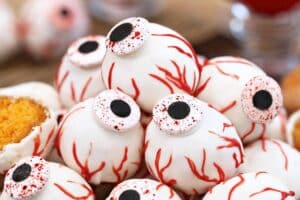 Photo of Donut Hole Eyeballs with text overlay for Pinterest.
