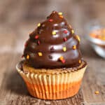 Close up of the top of a Pumpkin Spice Hi-Hat Cupcake.