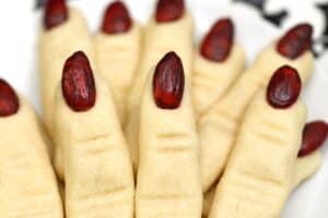 Photo of Witch Finger Cookies with text overlay for Pinterest.