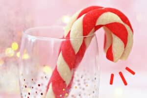 Photo of Candy Cane Cookies with text overlay for Pinterest.