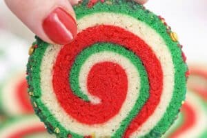 Photo of Christmas Pinwheel Cookies with text overlay for Pinterest.