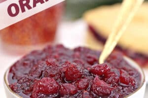 Photo of Cranberry Orange Sauce with text overlay for Pinterest.