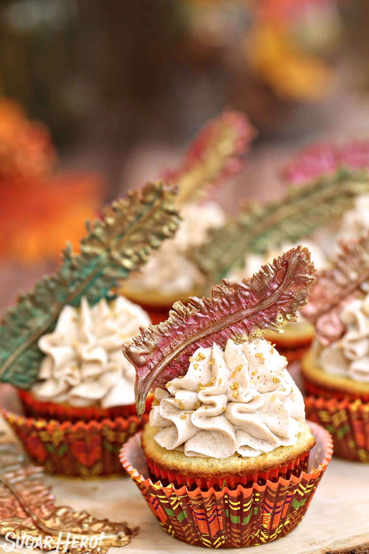 Group of Spice Cupcakes on a wooden platter.