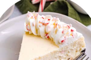 Picture of Candy Cane Cheesecake for with text overlay for Pinterest.