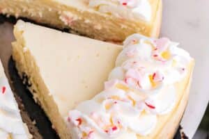 Picture of Candy Cane Cheesecake for with text overlay for Pinterest.