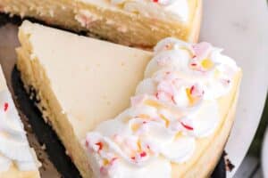 Picture of Candy Cane Cheesecake for with text overlay for Pinterest.