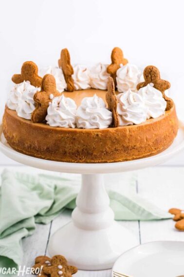 Gingerbread Cheesecake on a white cake plate.