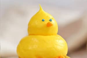 Photo of Baby Chick Cupcake with text overlay for Pinterest.