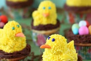 Photo of Spring Chick Cupcakes with text overlay for Pinterest.