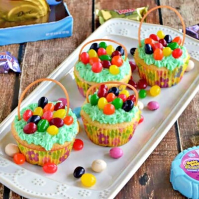 Rectangular platter with 4 Easter Basket Cupcakes for Easter Cupcake Round up.