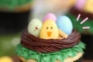 Photo of Easter Bird's Nest Cupcakes with text overlay for Pinterest.