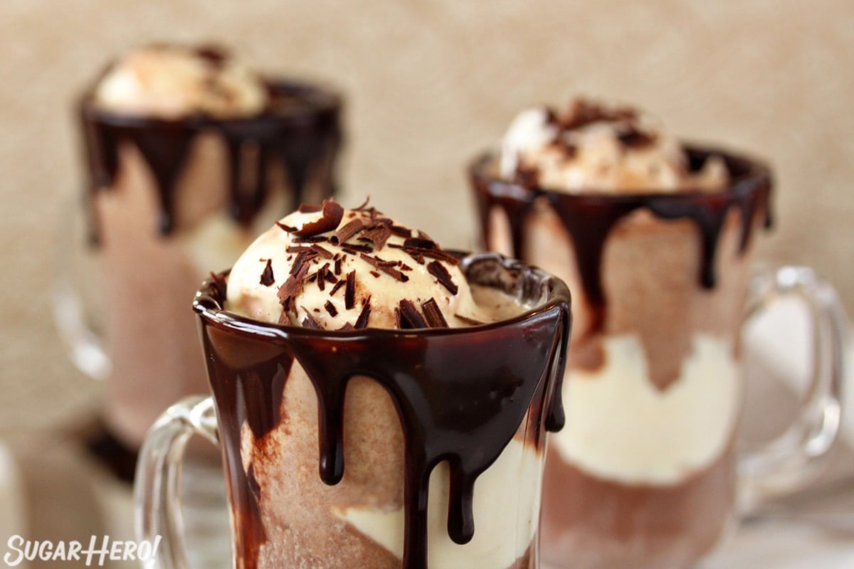 Close up of the tops of 3 Hot Chocolate Floats.