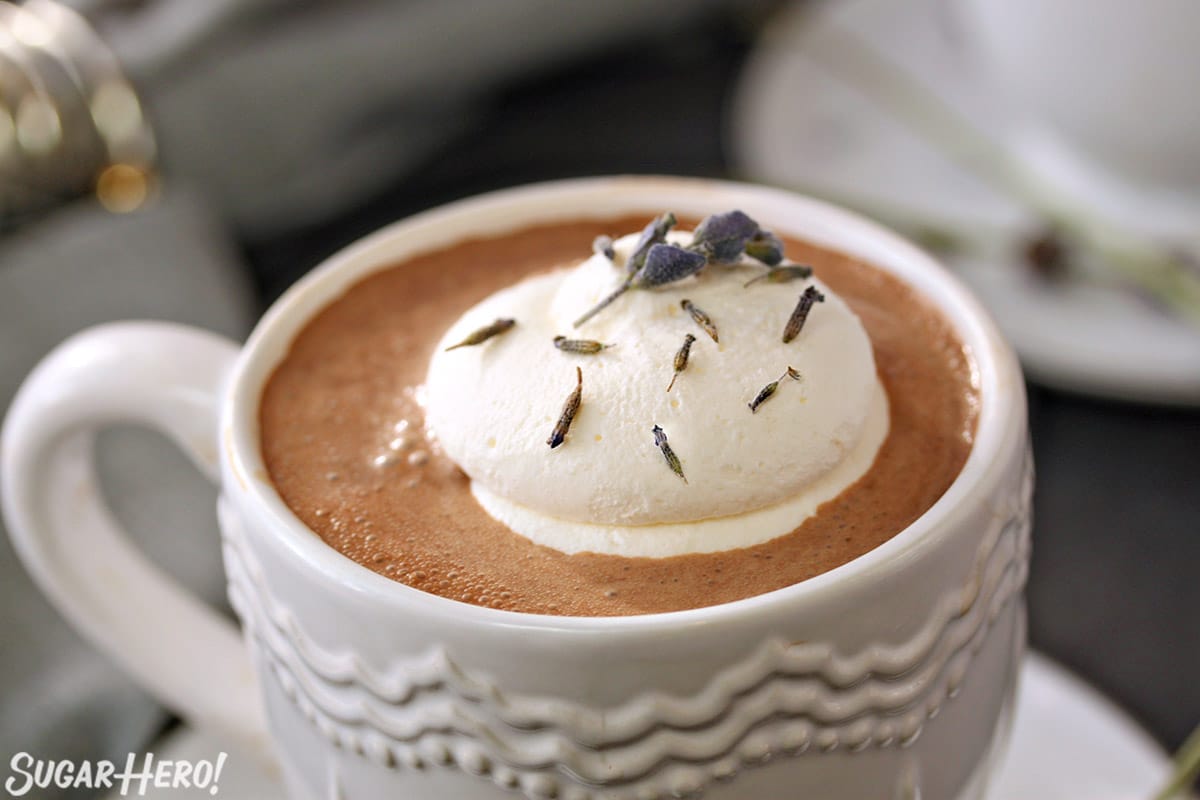 Lavender Hot Chocolate | SugarHero.com Close up of the top of a mug of Lavender Hot Chocolate.