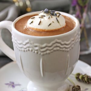 Close up of a white mug of Lavender Hot Chocolate.
