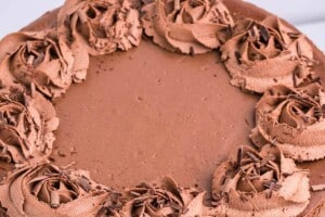 Photo of Chocolate Cheesecake with text overlay for Pinterest.