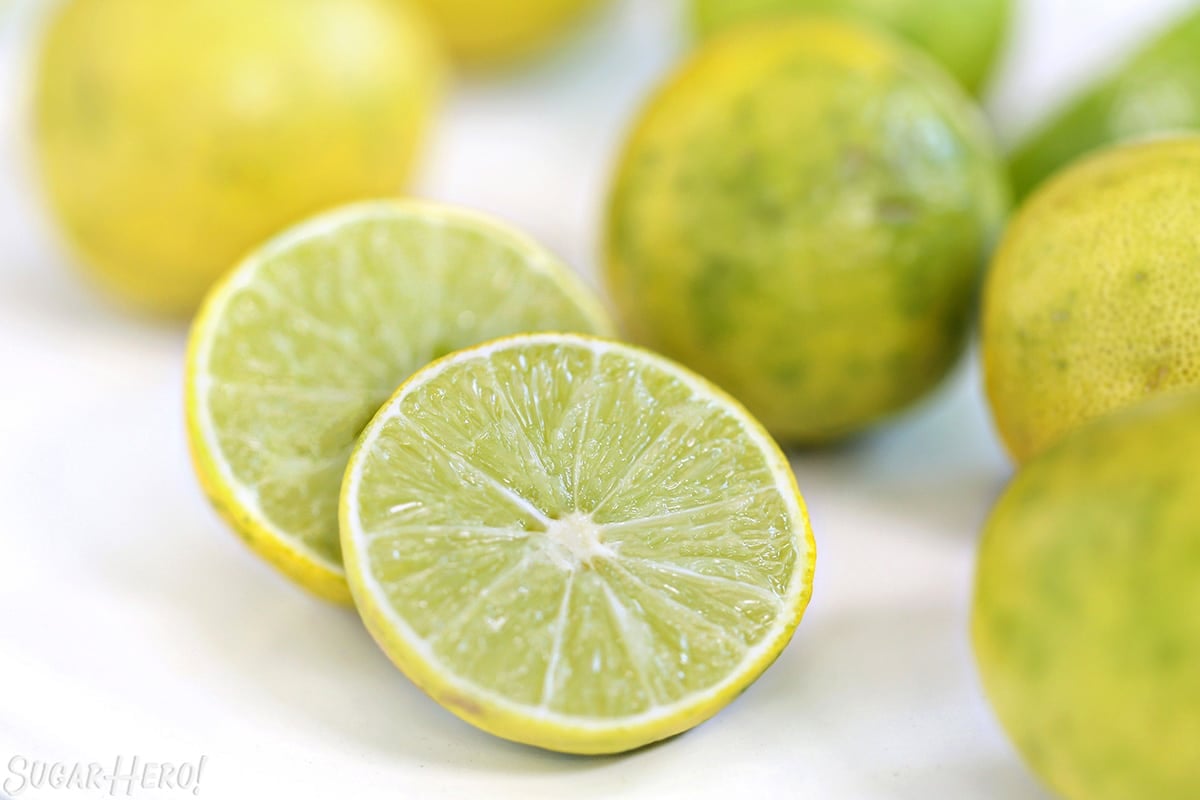 Close-up of two halves of a cut-up key lime.