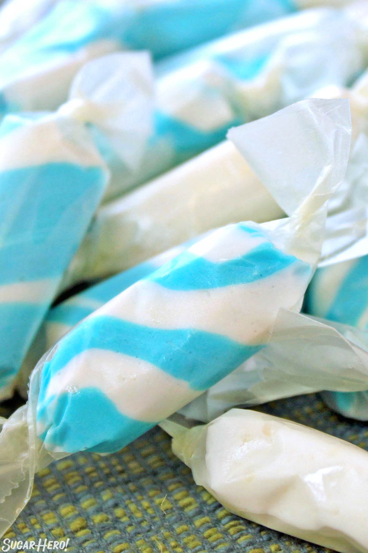 Close-up of blue and white striped saltwater taffy.