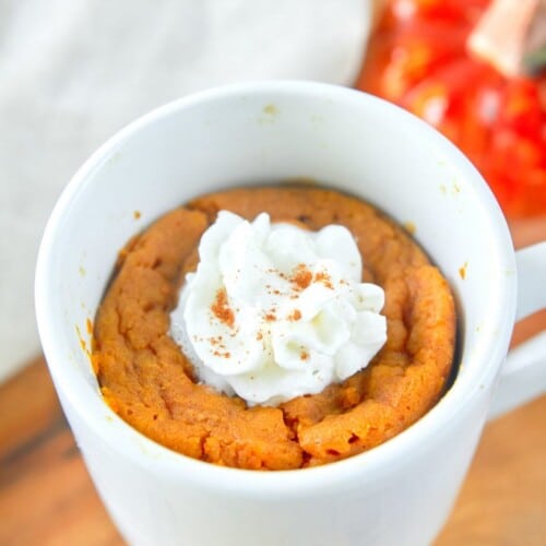 Vegan Pumpkin Mug in a white mug with whipped cream on top.