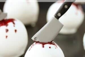 Bloody Halloween Cake Ball Truffles photo with text overlay for Pinterest.