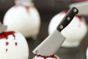 Bloody Halloween Cake Ball Truffles photo with text overlay for Pinterest.