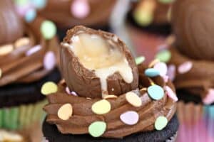 Image of Chocolate Crème Egg Cupcakes with chocolate buttercream with text overlay for Pinterest.