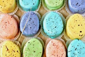Image of Easter Egg Petit Fours with text overlay or Pinterest.