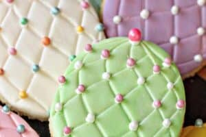 Image of Fondant Covered Easter Egg Cookies with text overlay for Pinterest.