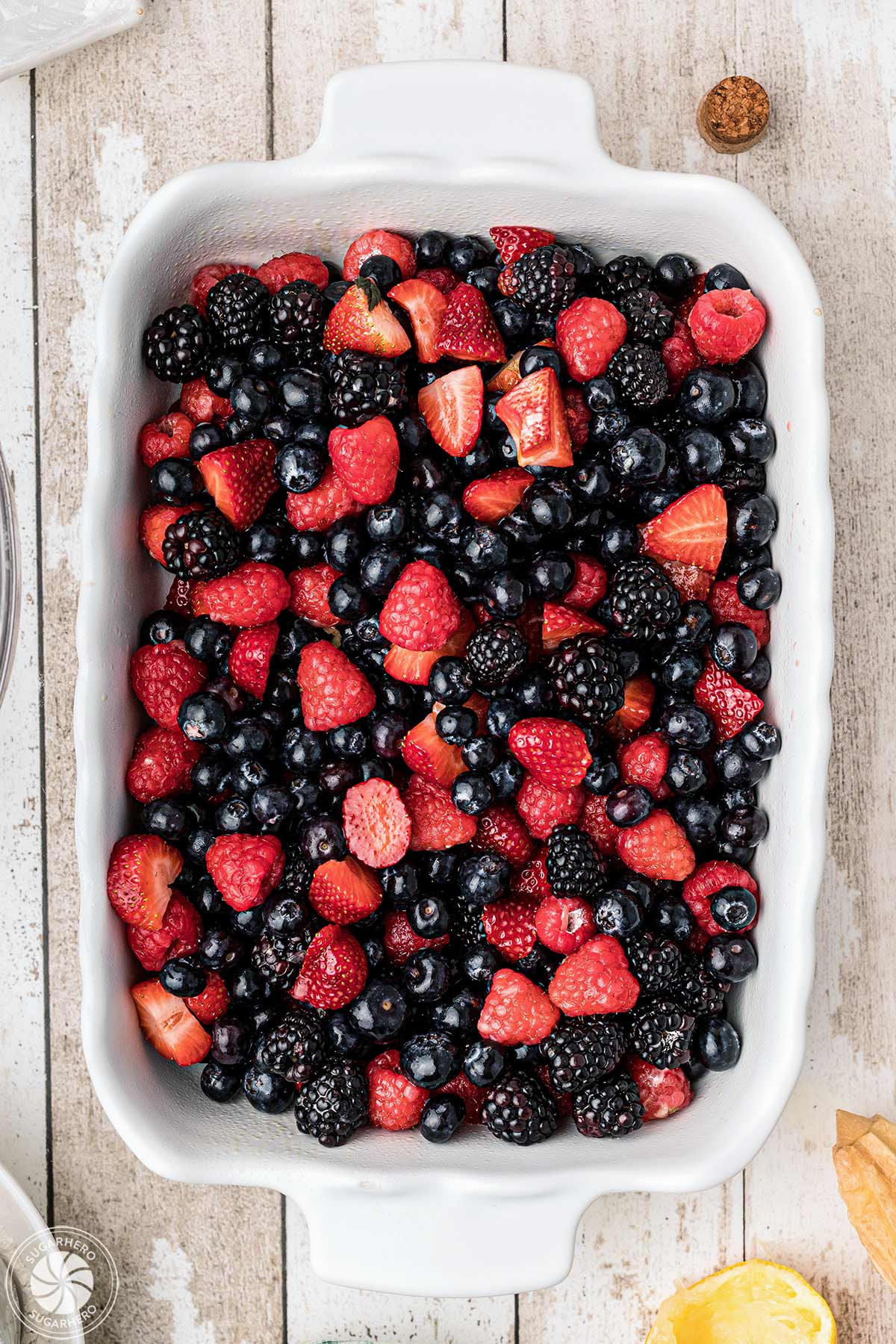Mixed berries in a baking dish.