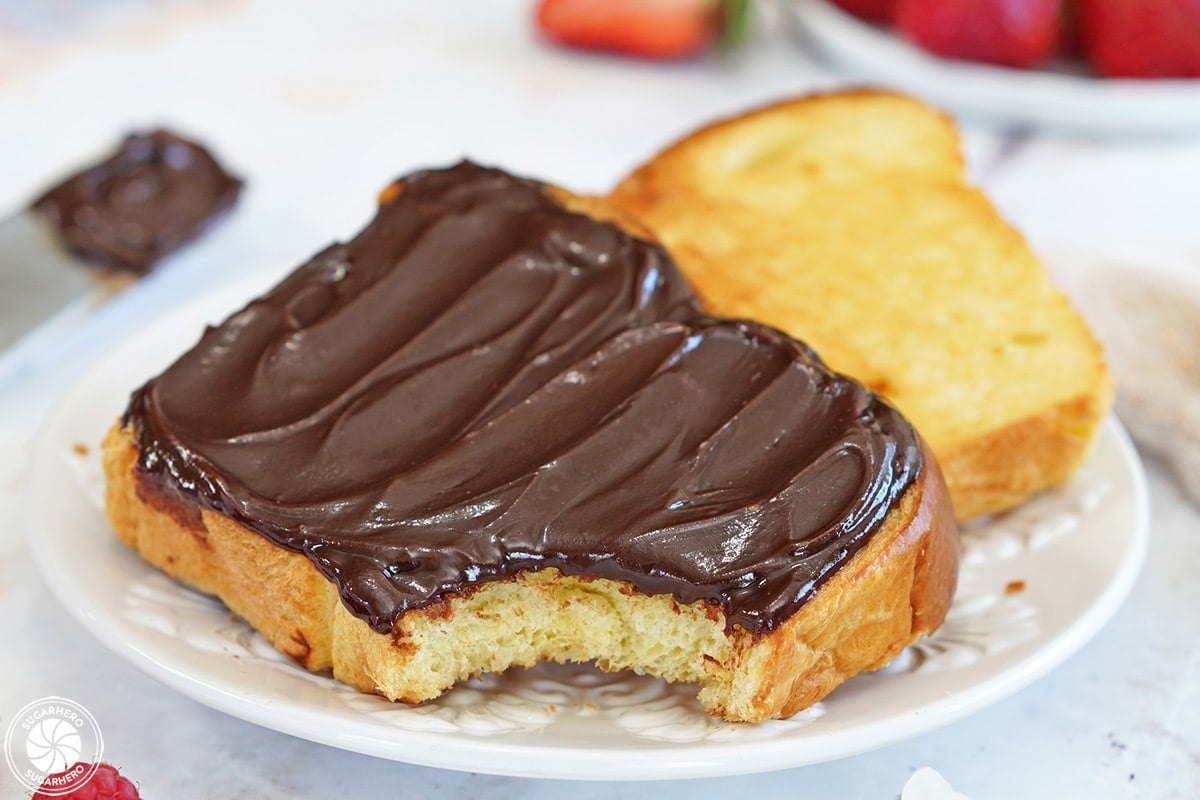 A slice of toast covered in Chocolate Spread.