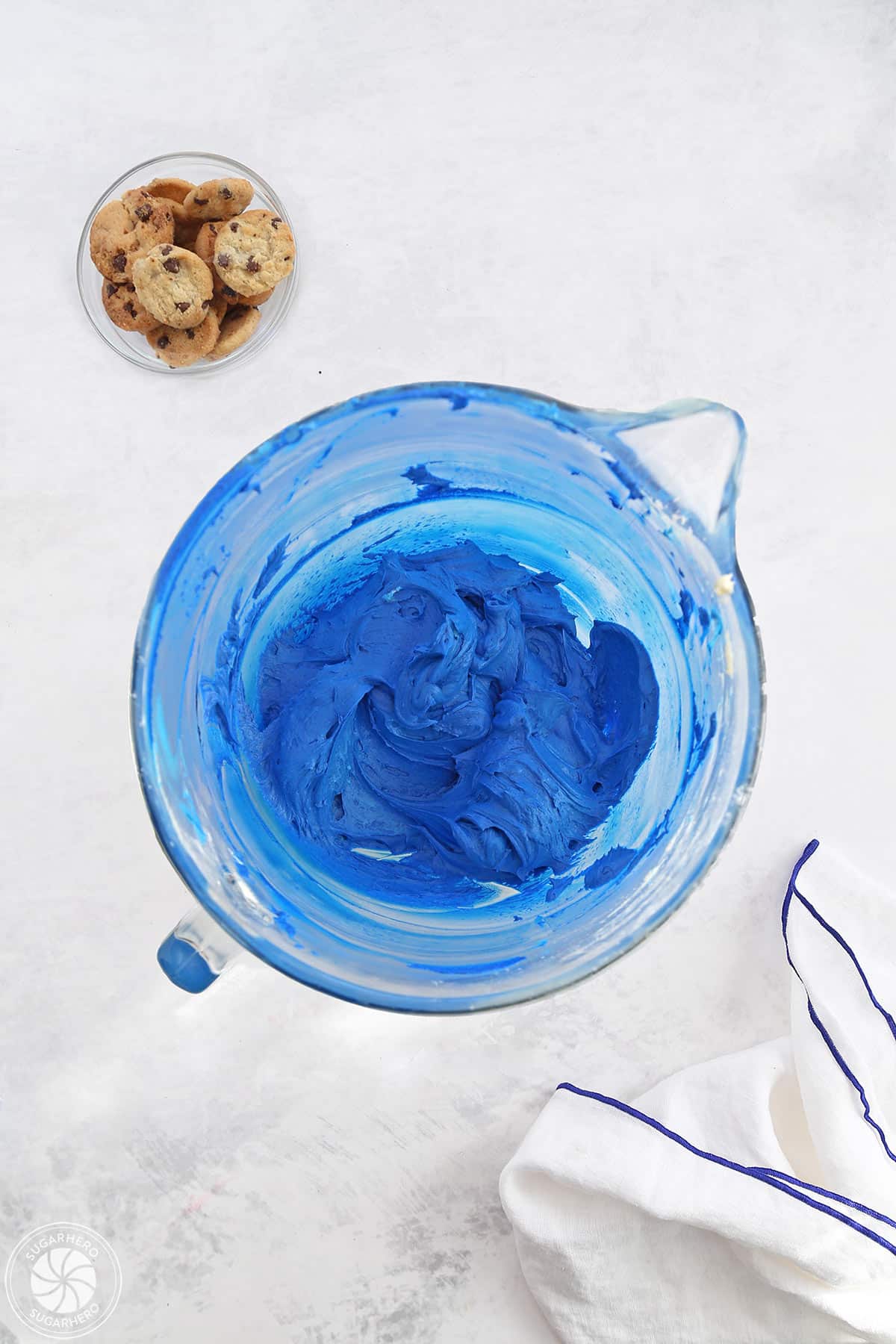 A bowl of blue frosting.