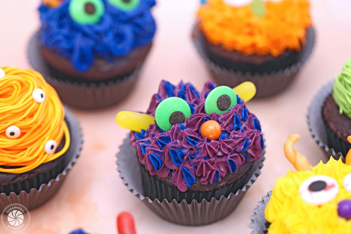 Close up of a blue and purple monster cupcake.