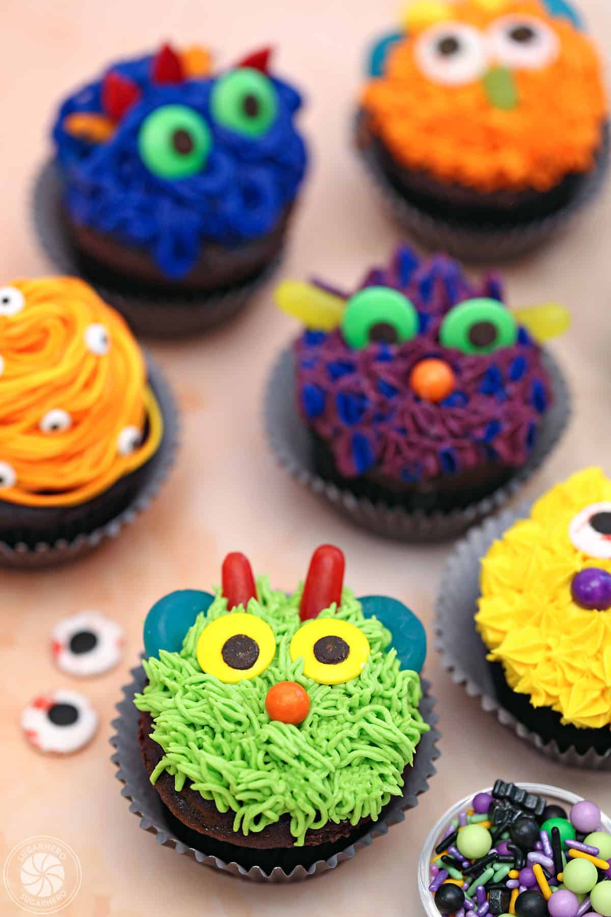 Top view of colorful monster cupcakes.