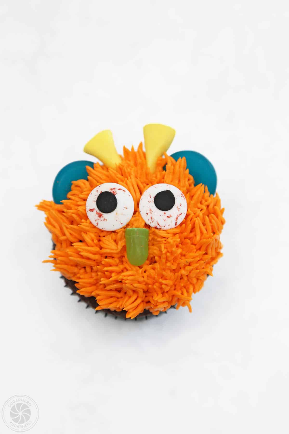 Top view of an orange Monster Cupcake.
