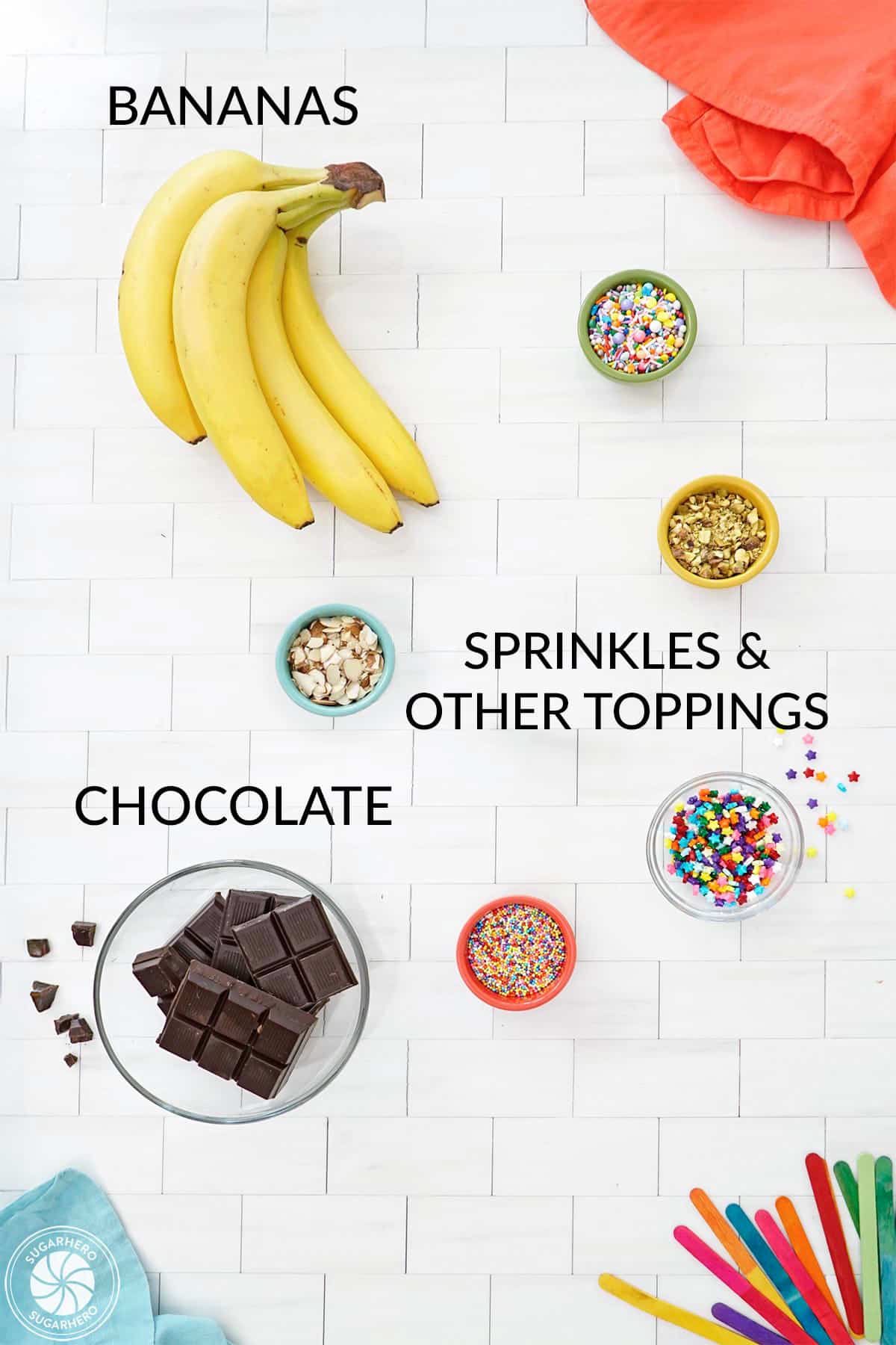 Ingredients needed for chocolate-dipped frozen bananas with labels.