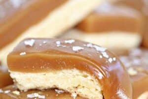 A photo of salted caramel bars with text overlay for Pinterest.