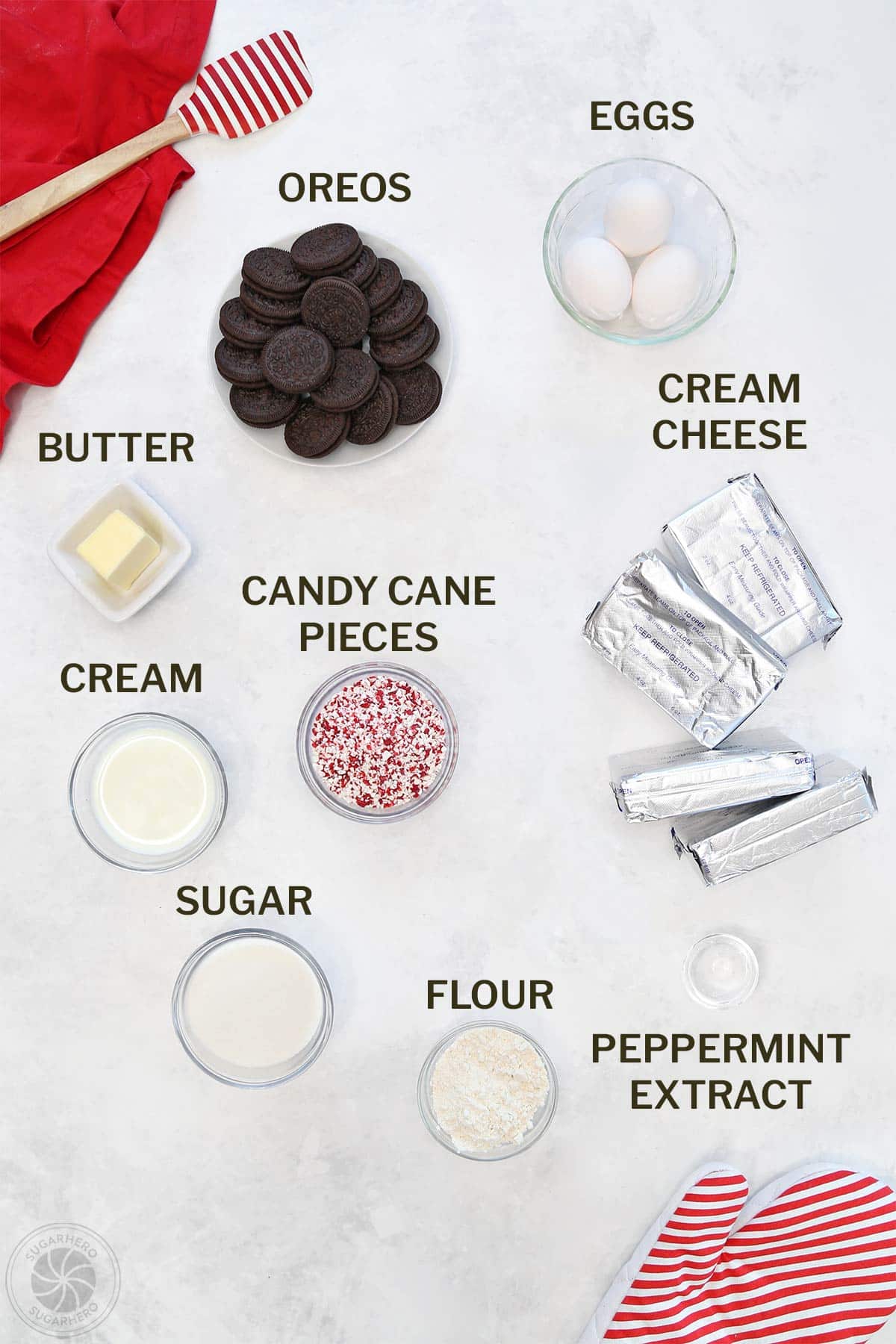 Ingredients needed for candy cane cheesecake with labels.