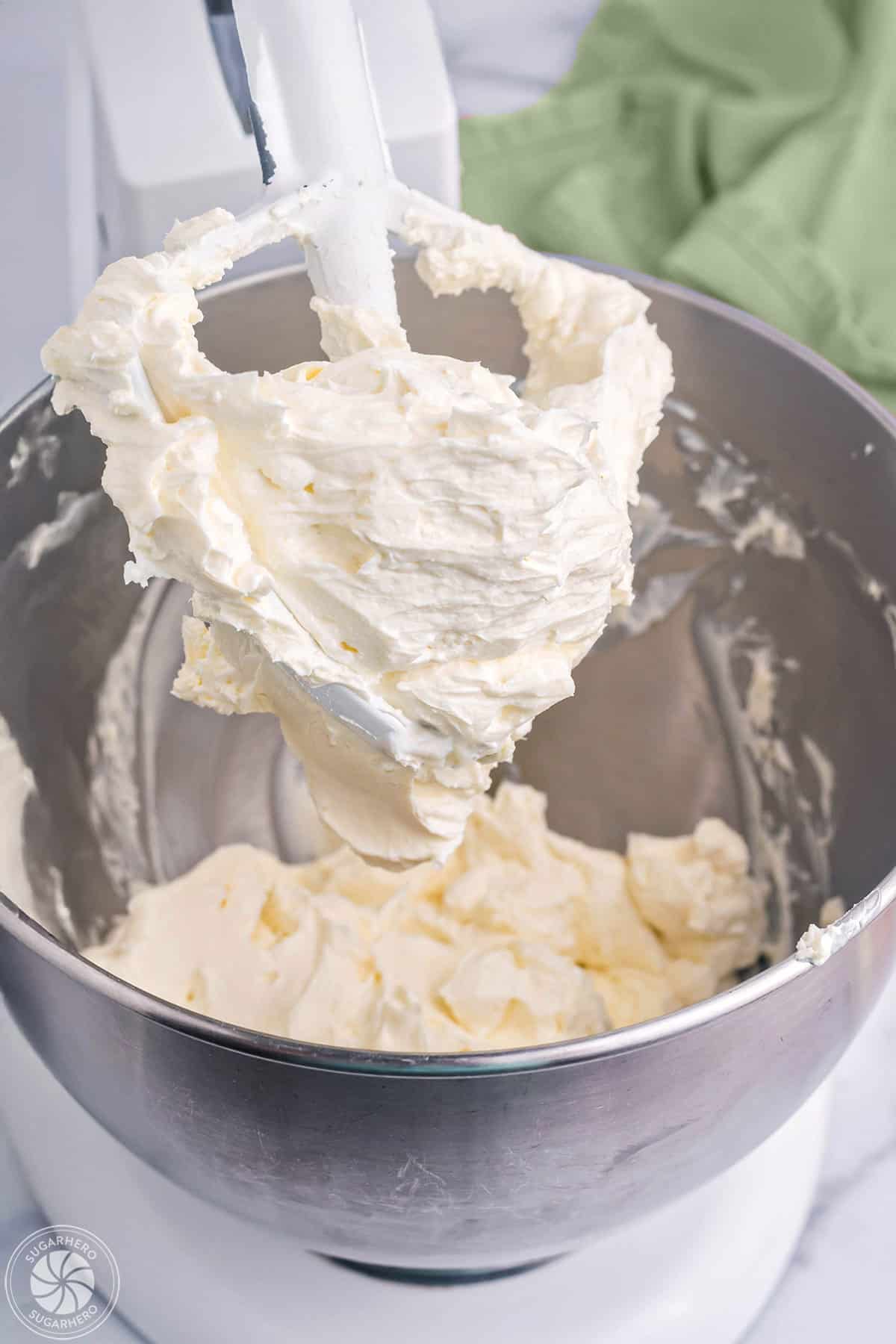 Whipped cream cheese in a mixer bowl.