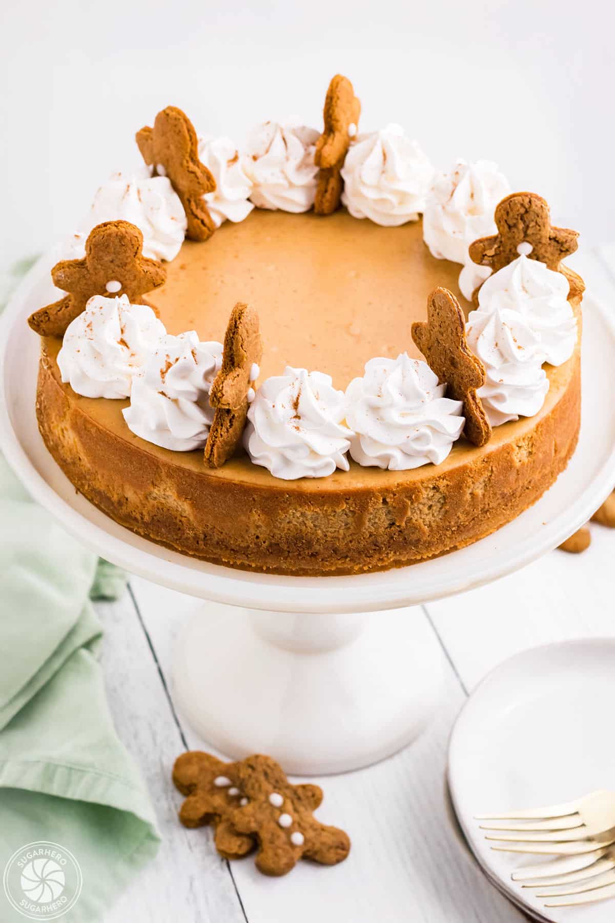 Top view of a Gingerbread Cheesecake on a white cake stand.