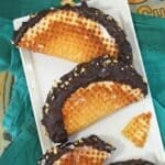 Two homemade choco tacos on a platter.