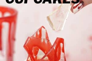 An image of bloody glass cupcakes with text overlay for Pinterest.