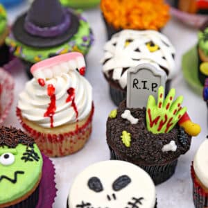 Group of mixed Halloween cupcakes.