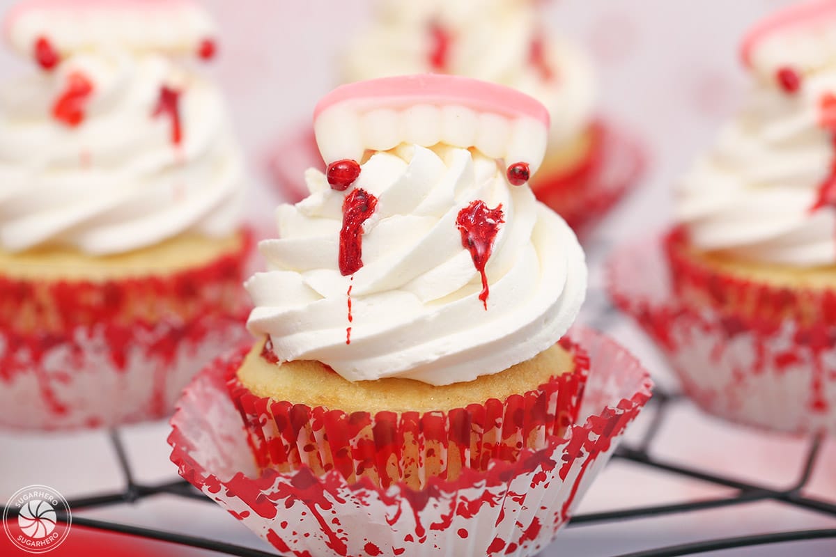 Close up of a few vampire bite cupcakes.