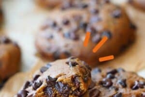 An image of pumpkin chocolate chip cookies with text overlay for Pinterest.