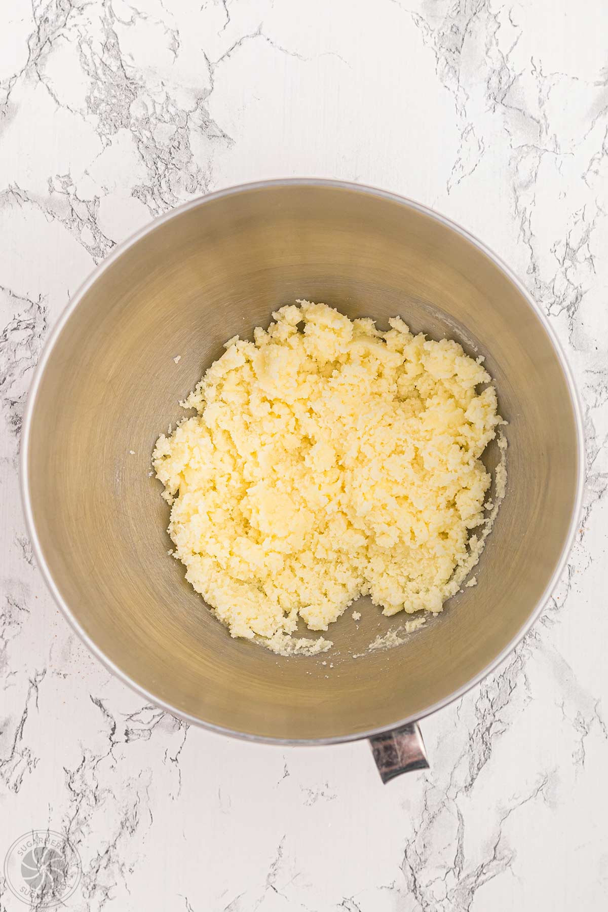Creamed butter and sugar in a mixing bowl.